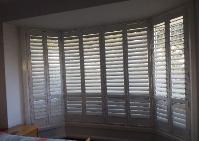 Interior plantation shutters for windows