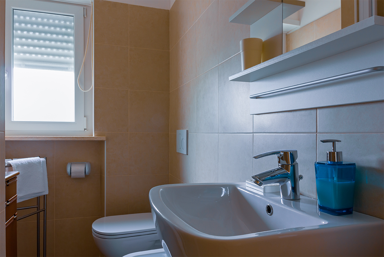 Roller shutters installed in a bathroom.