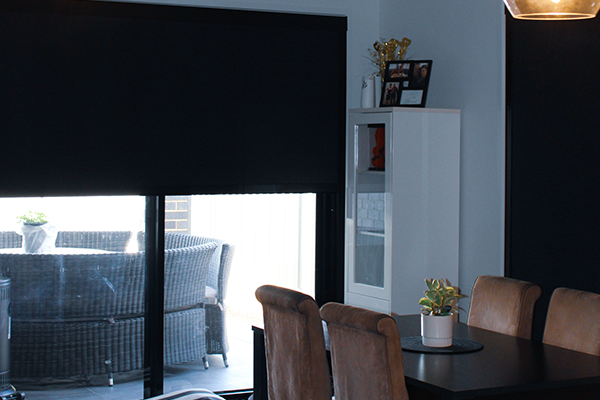 Dining Room with blackout blinds installed.